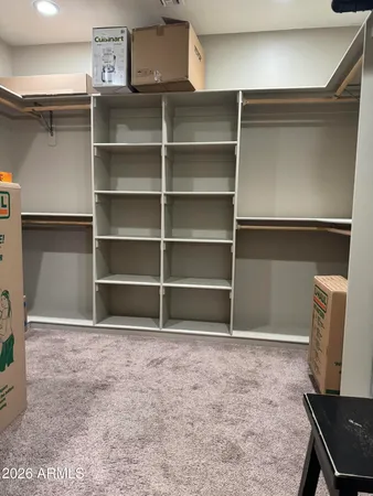 a bathroom with a sink vanity and mirror