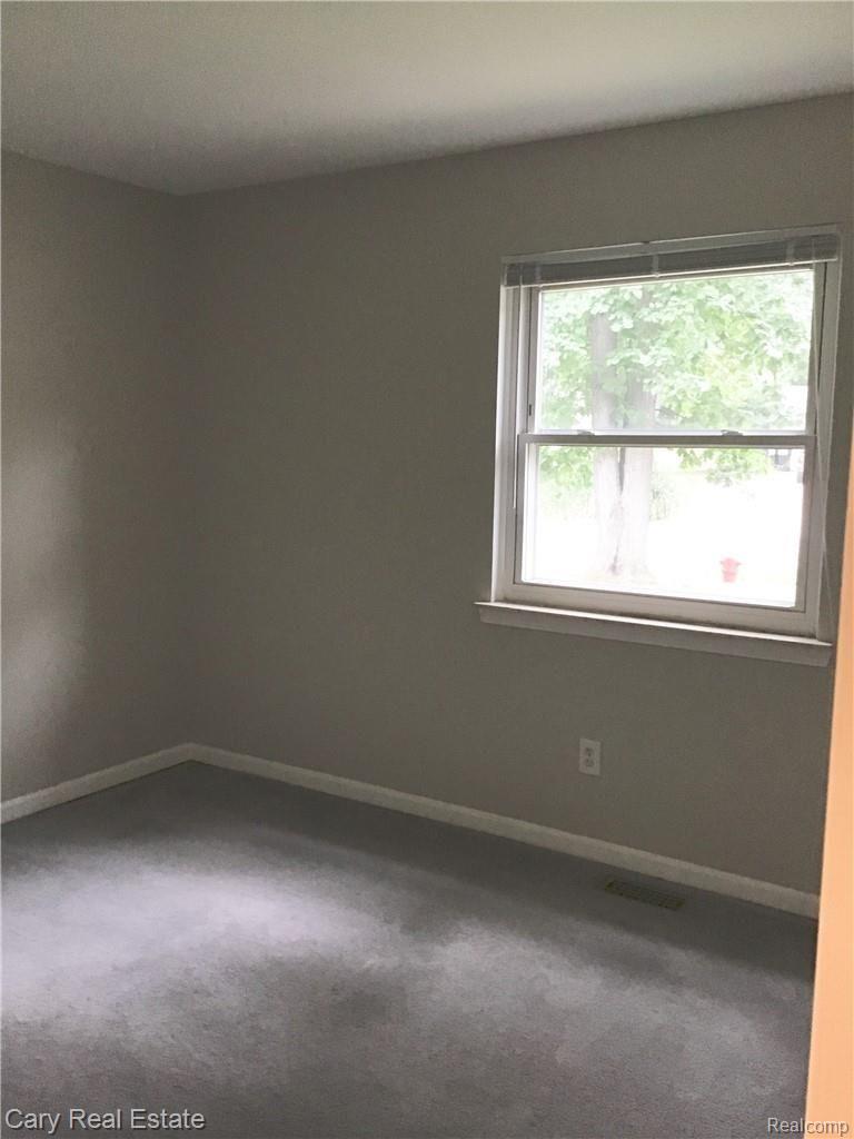 1311 Delta Road Walled Lake, MI 48390 - Photo 14 of 19 Bedroom 3