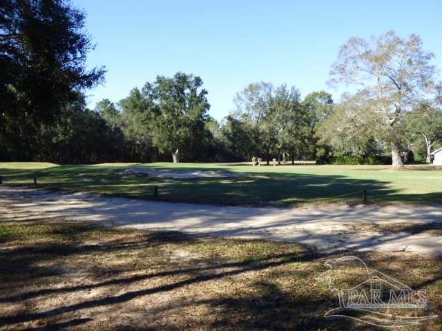 5630 Wychewood Road Milton, FL 32570 - Photo 3 of 45 14th hole out your back door.