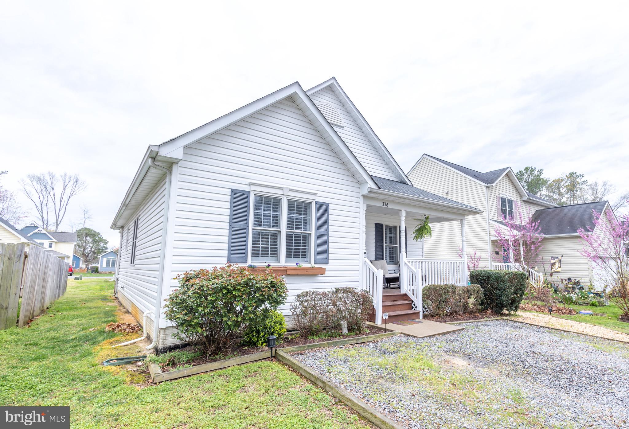 336 4th Street Colonial Beach, VA 22443 - Photo 6 of 23 a view of a house with backyard and sitting area
