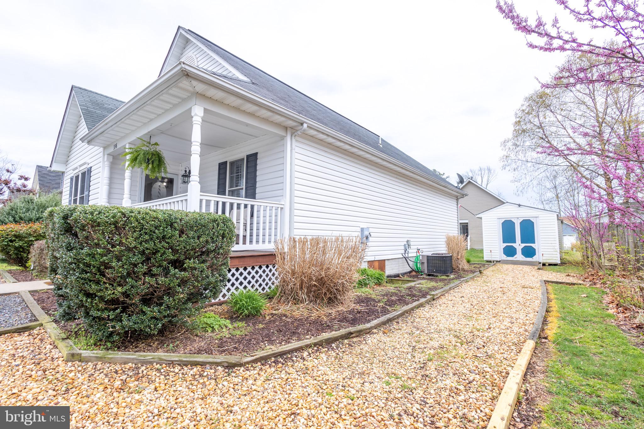 336 4th Street Colonial Beach, VA 22443 - Photo 7 of 23 a front view of a house with garden