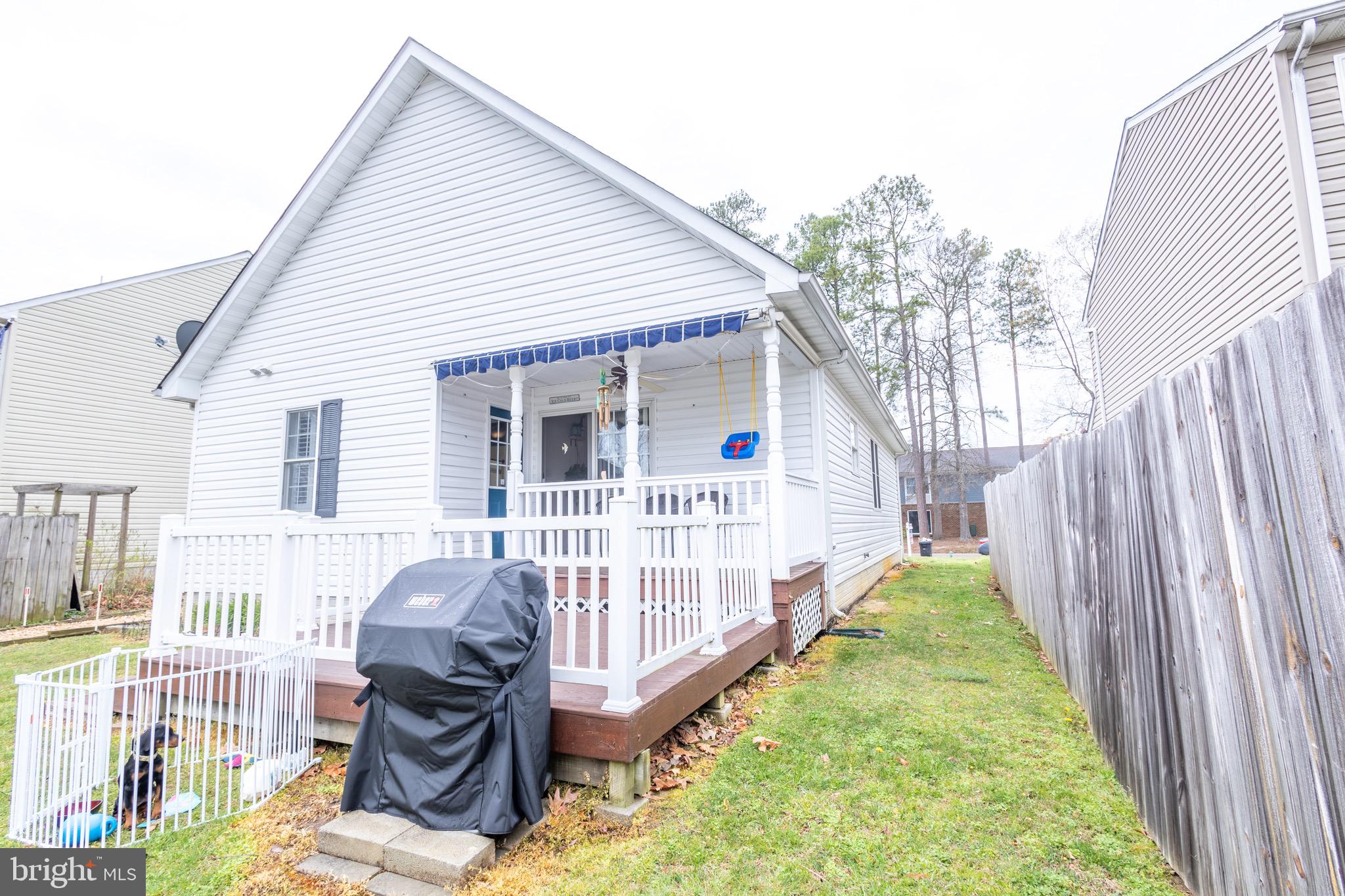 336 4th Street Colonial Beach, VA 22443 - Photo 9 of 23 a view of a house with backyard and porch