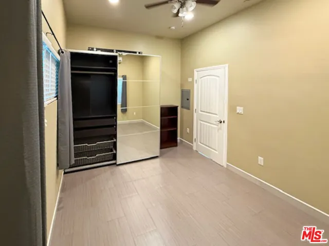 a view of an empty room with a fireplace