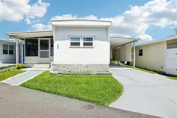 a view of a house with entertaining space