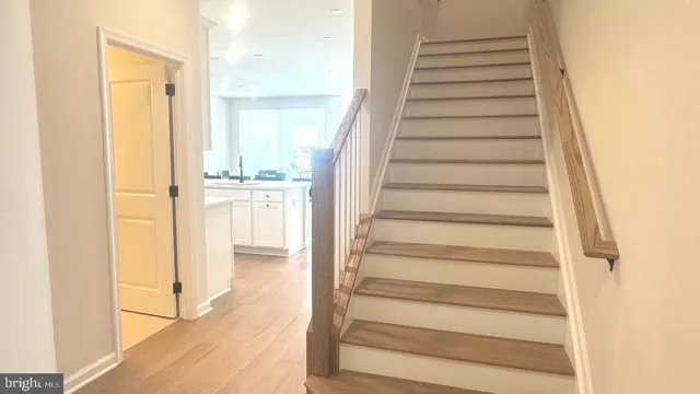 a view of entryway with wooden floor