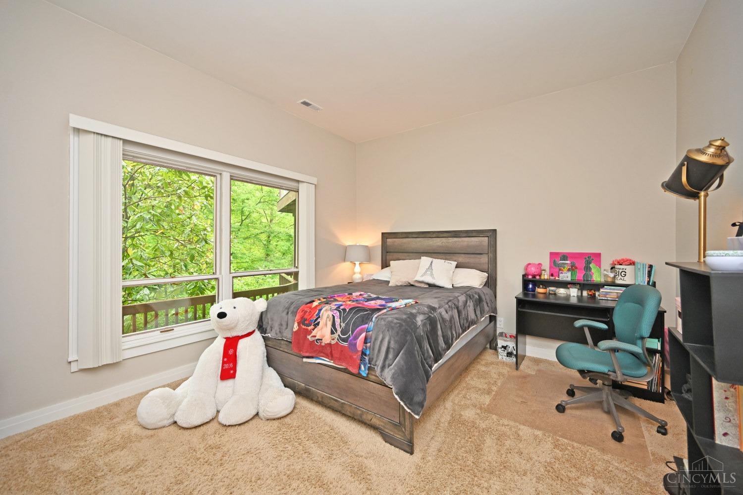 7811 Hopper Road Cincinnati, OH 45255 - Photo 32 of 48 Additional lower level bedroom with private wooded views. Bedroom features amazing walk-in closet!