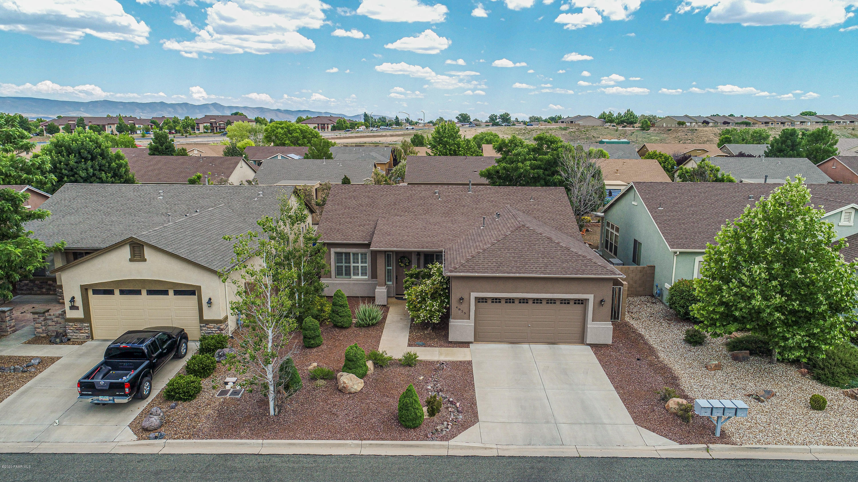 4825 Edgemont Road Prescott Valley, AZ 86314 - Photo 2 of 34 an aerial view of a house with a garden and balcony