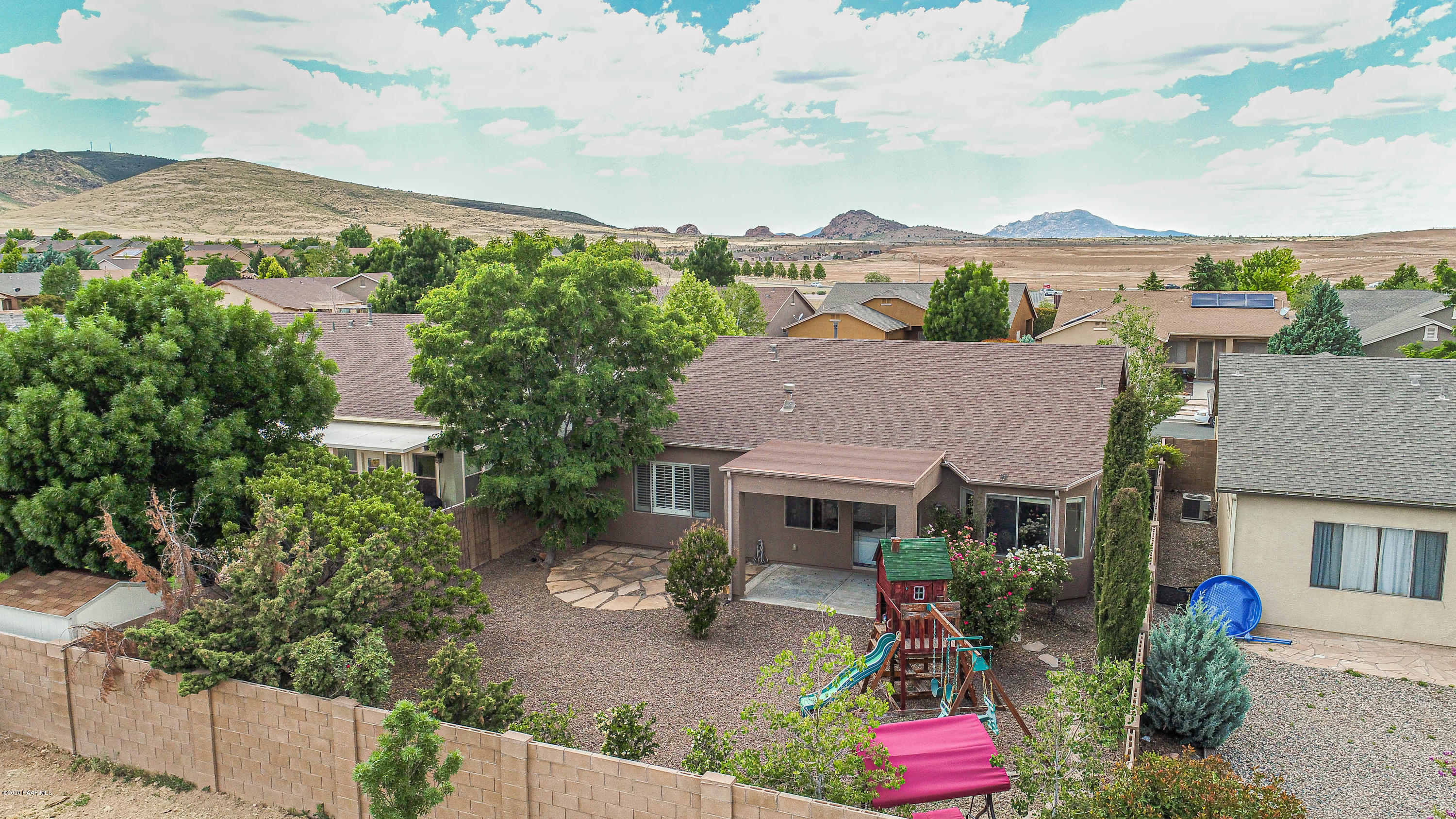 4825 Edgemont Road Prescott Valley, AZ 86314 - Photo 4 of 34 an aerial view of a house