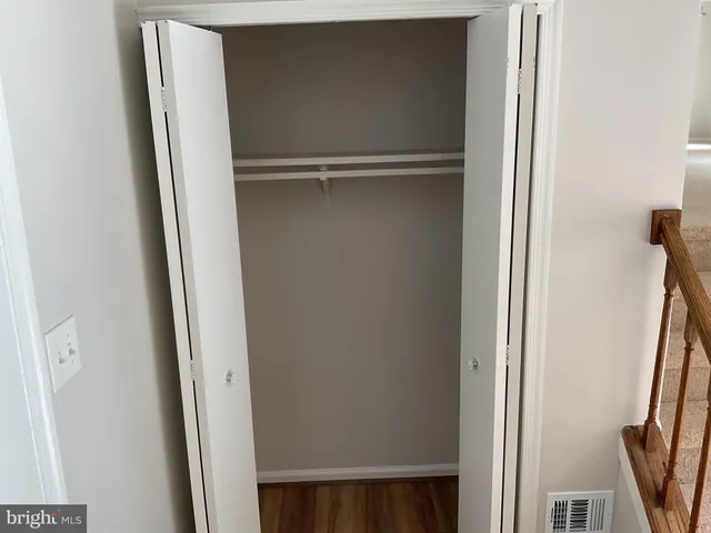 a kitchen with a stove a sink and a microwave