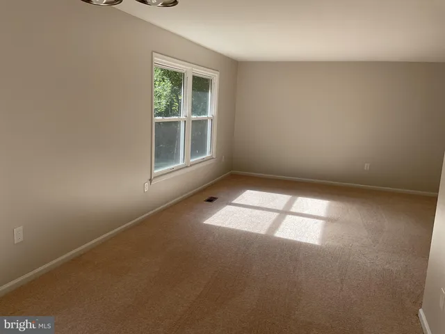 an empty room with closet