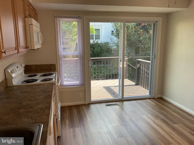 a view of a bathroom from a hallway