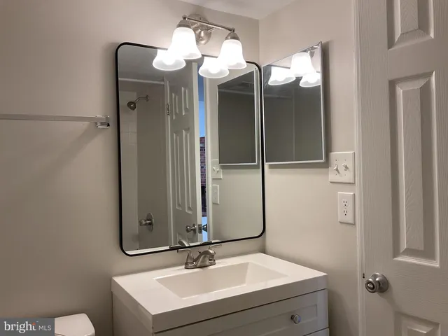 a view of a livingroom with furniture and a fireplace