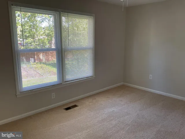 an empty room with a door