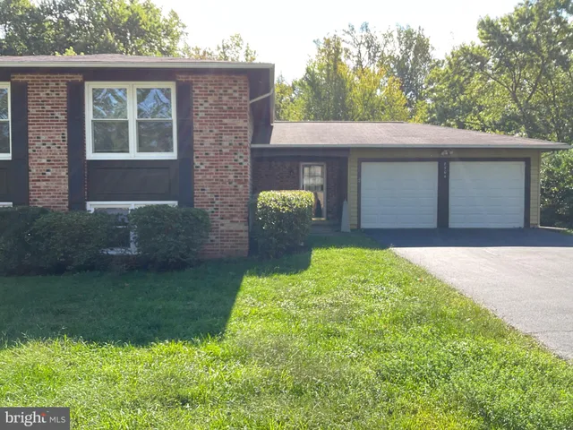 a view of balcony with wooden floor and seating space