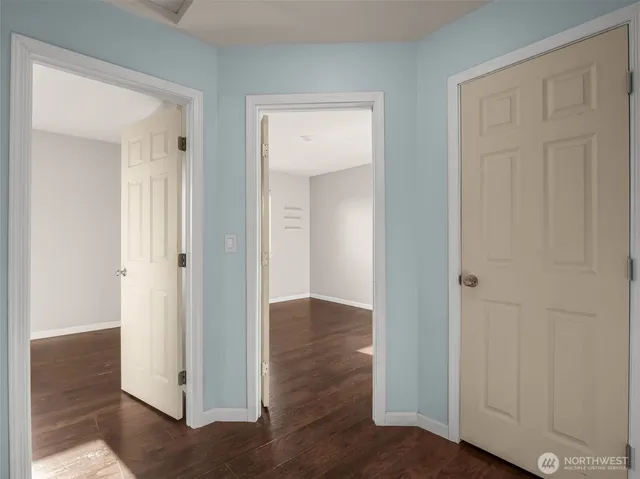 a view of entryway with wooden floor