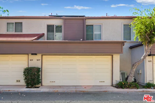 a front view of house with yard