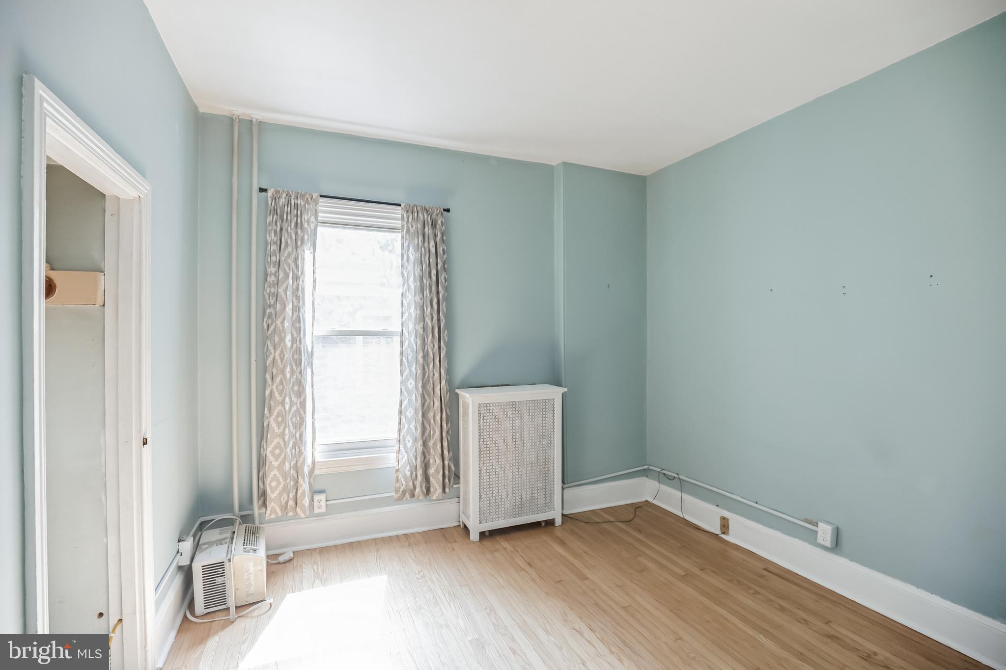 117 Rochelle Avenue Philadelphia, PA 19128 - Photo 22 of 29 a view of an empty room and window