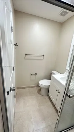 a bathroom with a sink and toilet