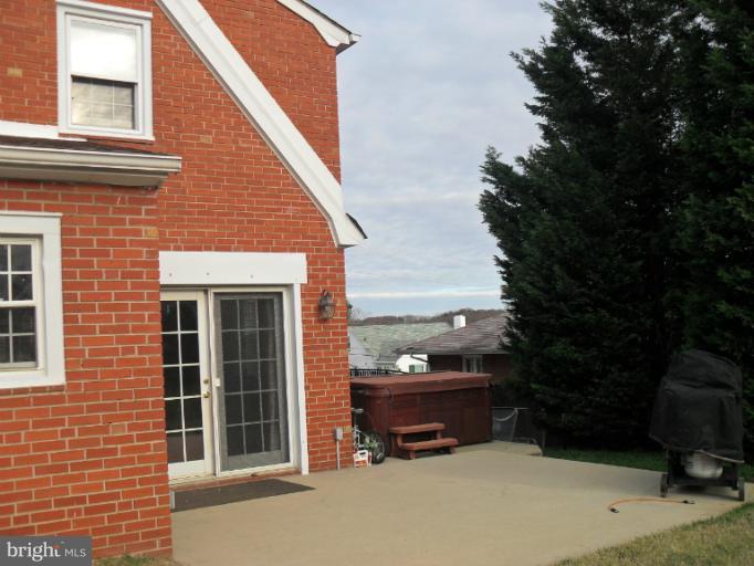1310 Beatty Avenue Rosedale, MD 21237 - Photo 14 of 21 a view of a terrace with a bench and trees