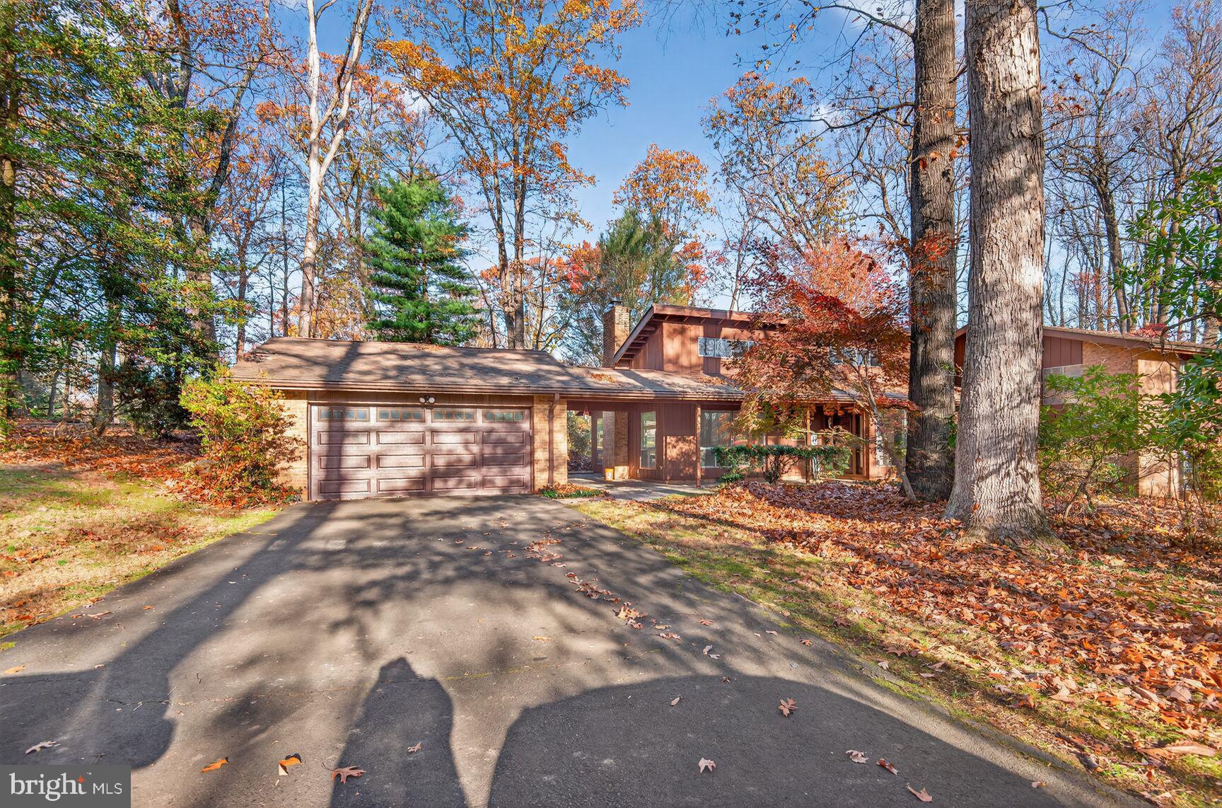 a view of a large building with large trees