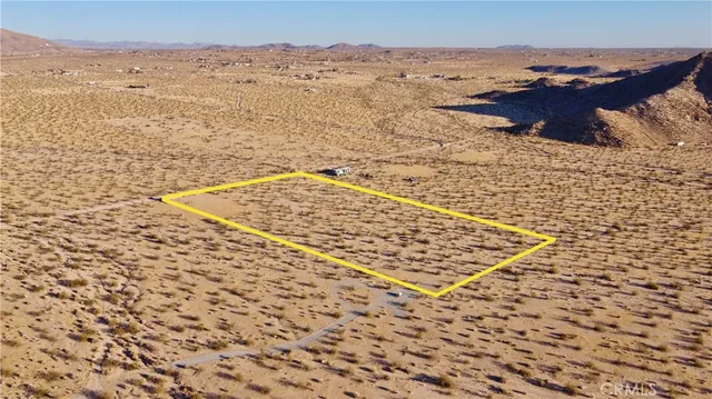 a view of wooden floor in front of house