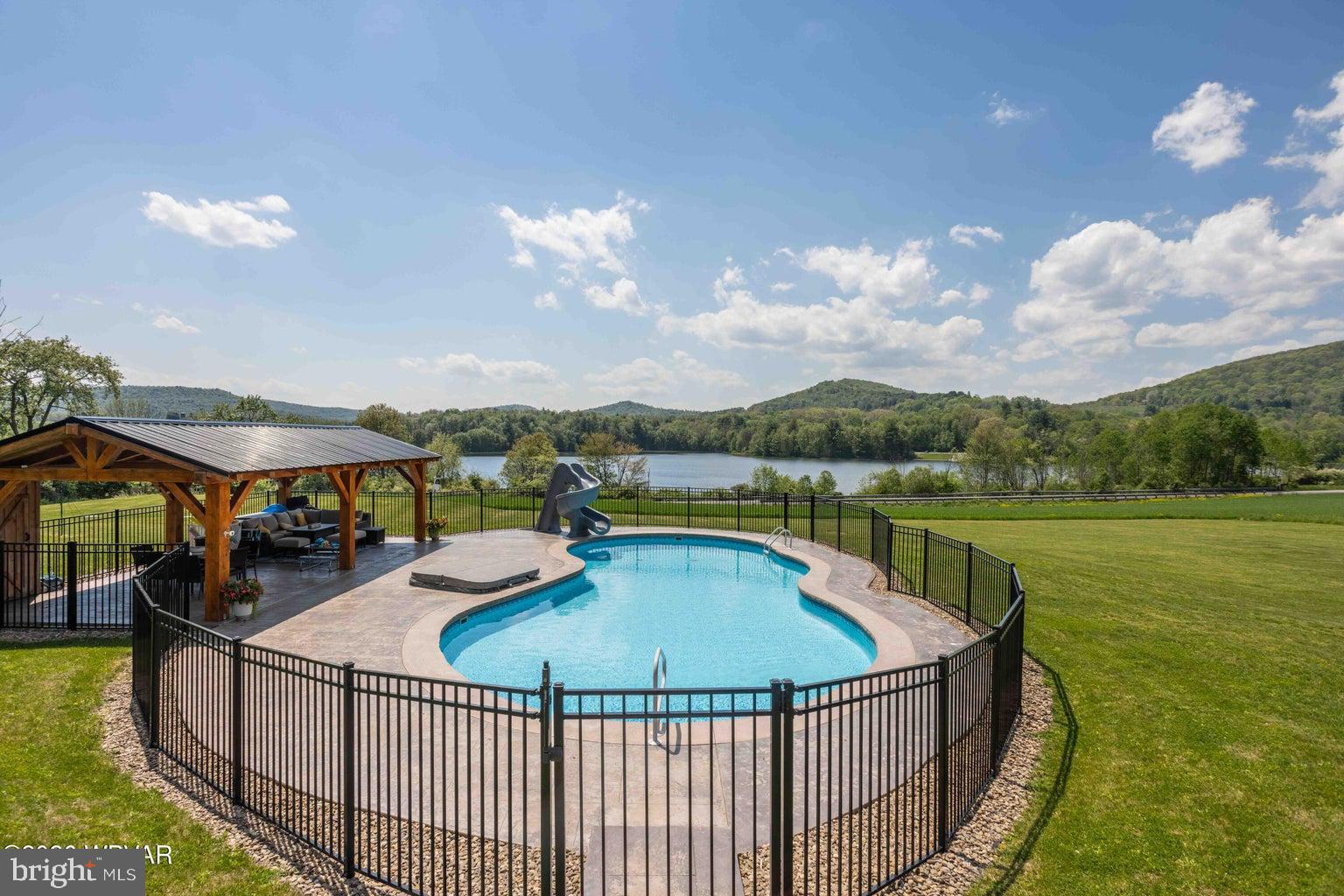 92 Easton Road Trout Run, PA 17771 - Photo 22 of 108 Serene poolside retreat with scenic views.