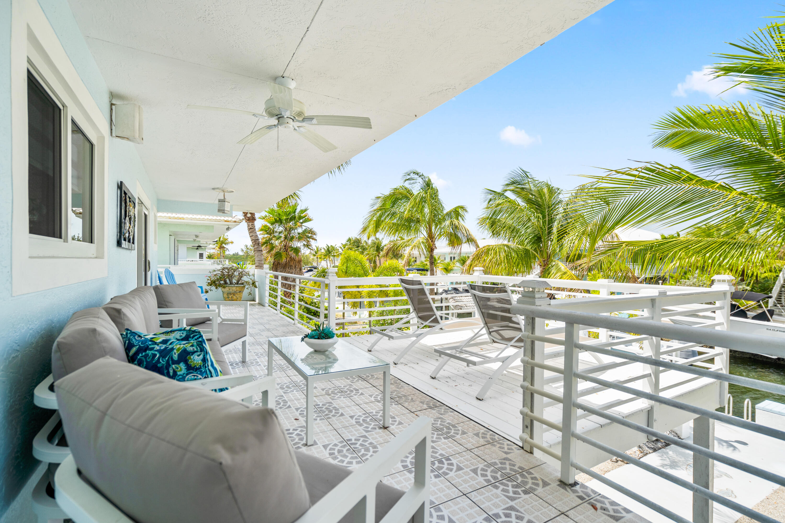 130 Lorelane Place Key Largo, FL 33037 - Photo 27 of 67 a view of a chairs and table in a patio