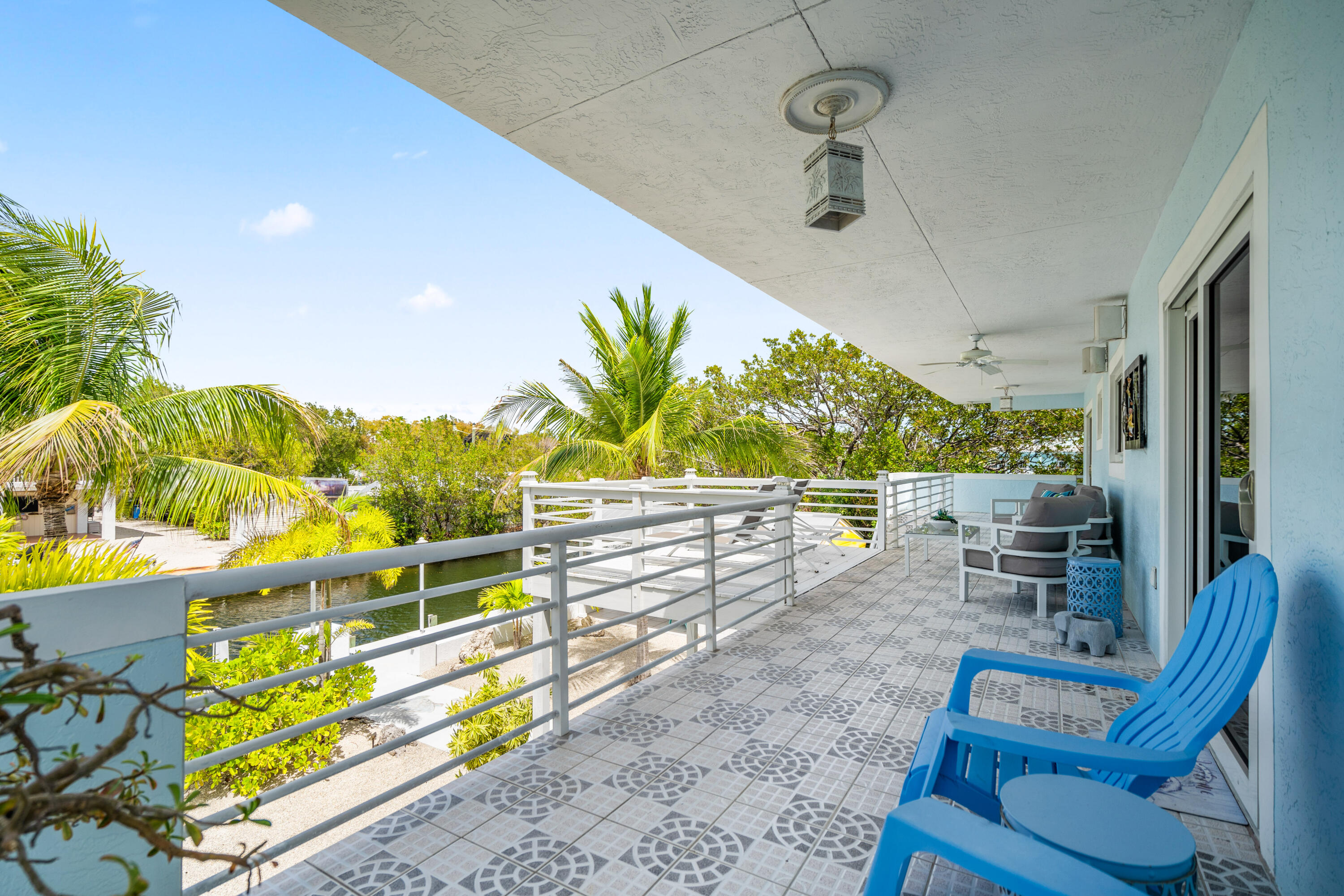 130 Lorelane Place Key Largo, FL 33037 - Photo 29 of 67 a view of a chairs and table in patio