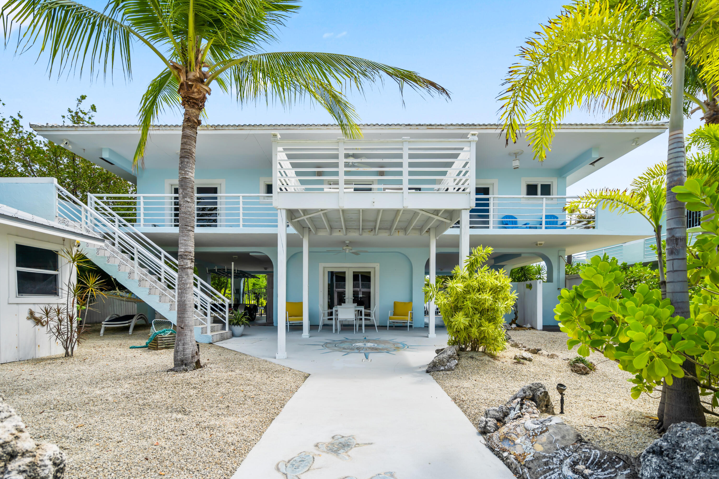 130 Lorelane Place Key Largo, FL 33037 - Photo 31 of 67 a view of a house with a patio