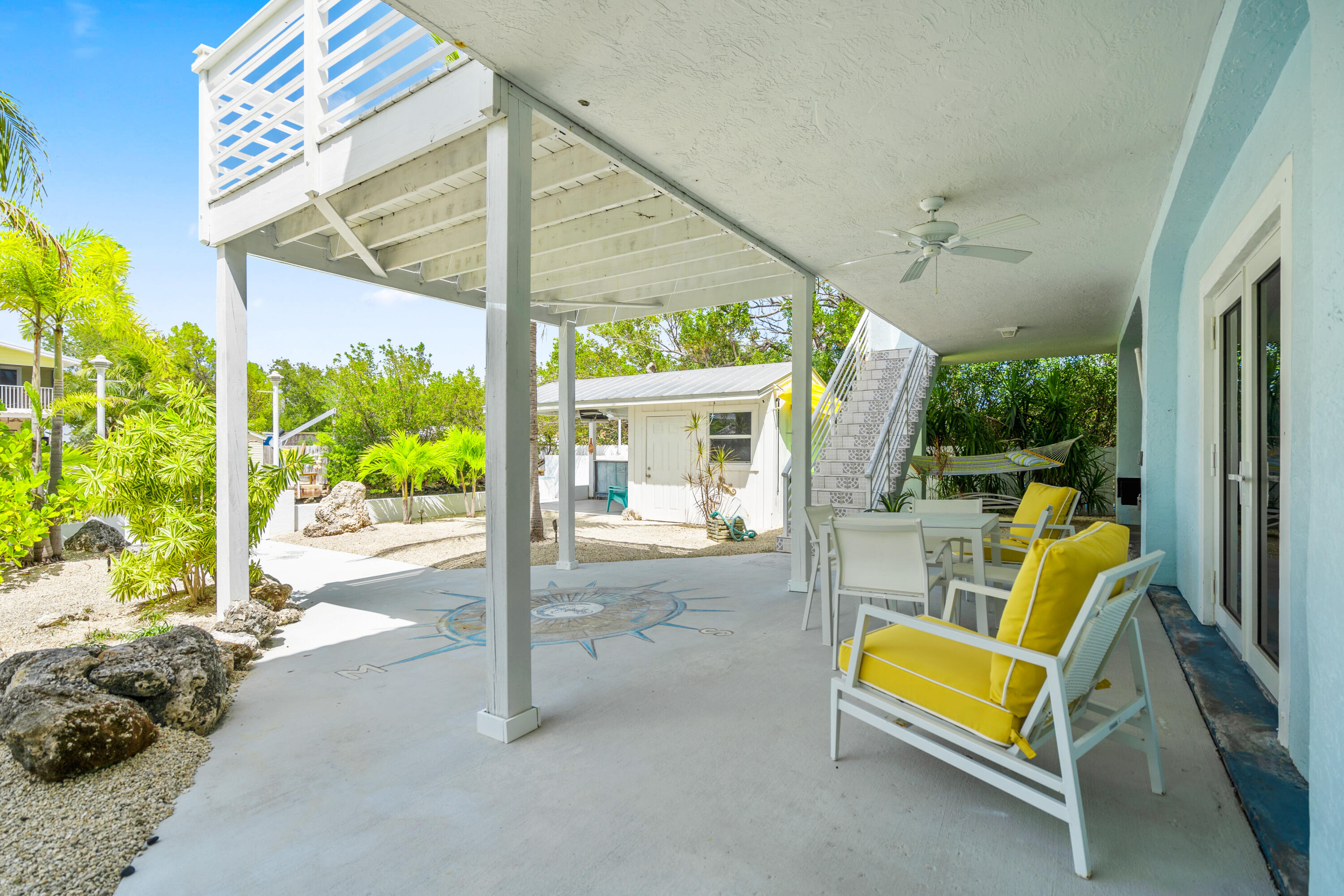 130 Lorelane Place Key Largo, FL 33037 - Photo 41 of 67 a view of backyard with swimming pool and outdoor seating