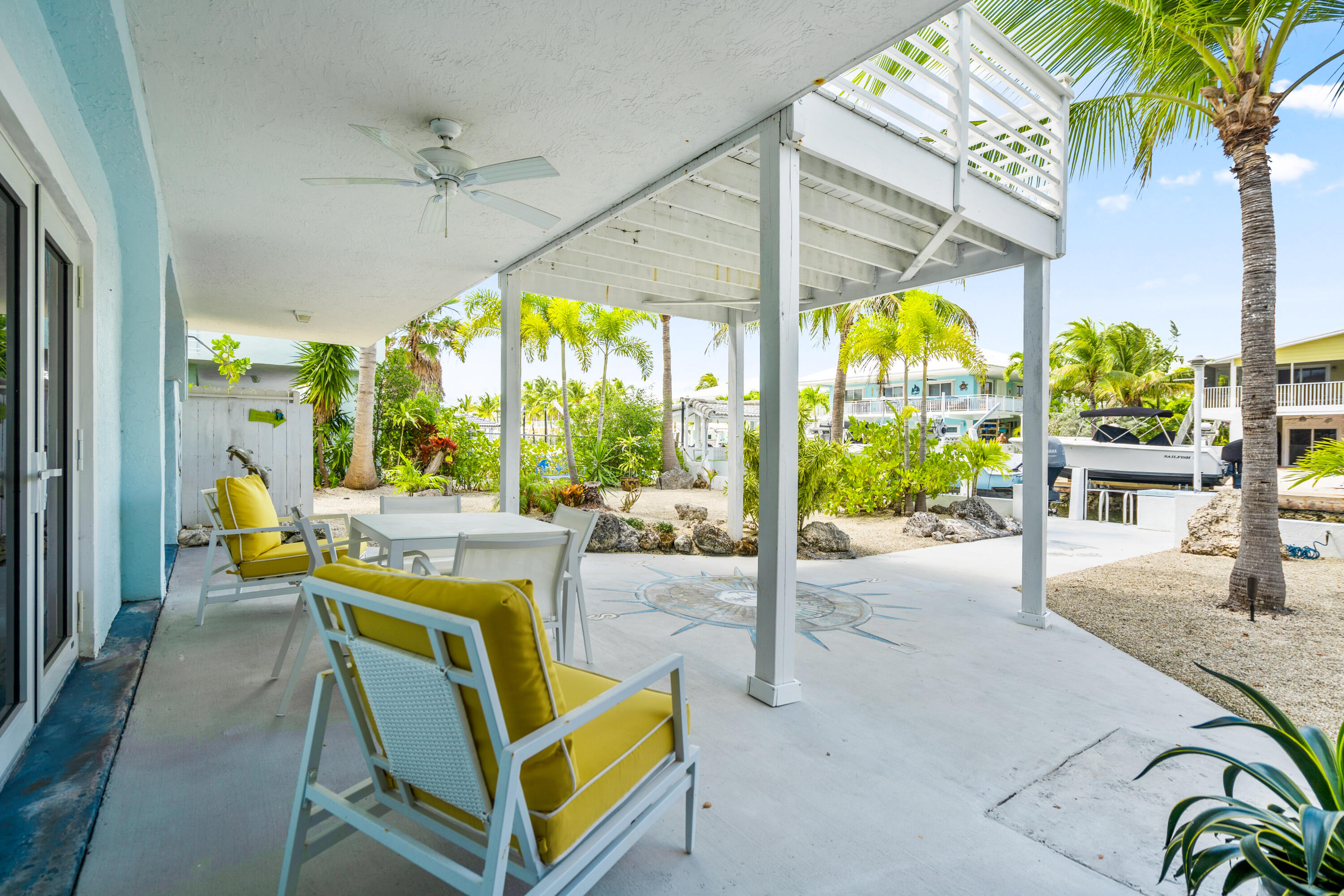 130 Lorelane Place Key Largo, FL 33037 - Photo 42 of 67 a view of a swimming pool with a patio