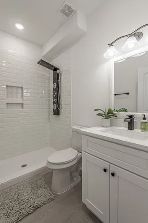 a view of a dining room with furniture and window