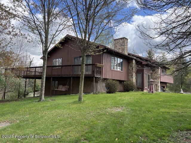 4935 Highway 3001 Meshoppen, PA 18630 - Photo 1 of 31 a view of a house with a yard and a large tree