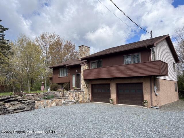 4935 Highway 3001 Meshoppen, PA 18630 - Photo 4 of 31 a front view of a house with a yard