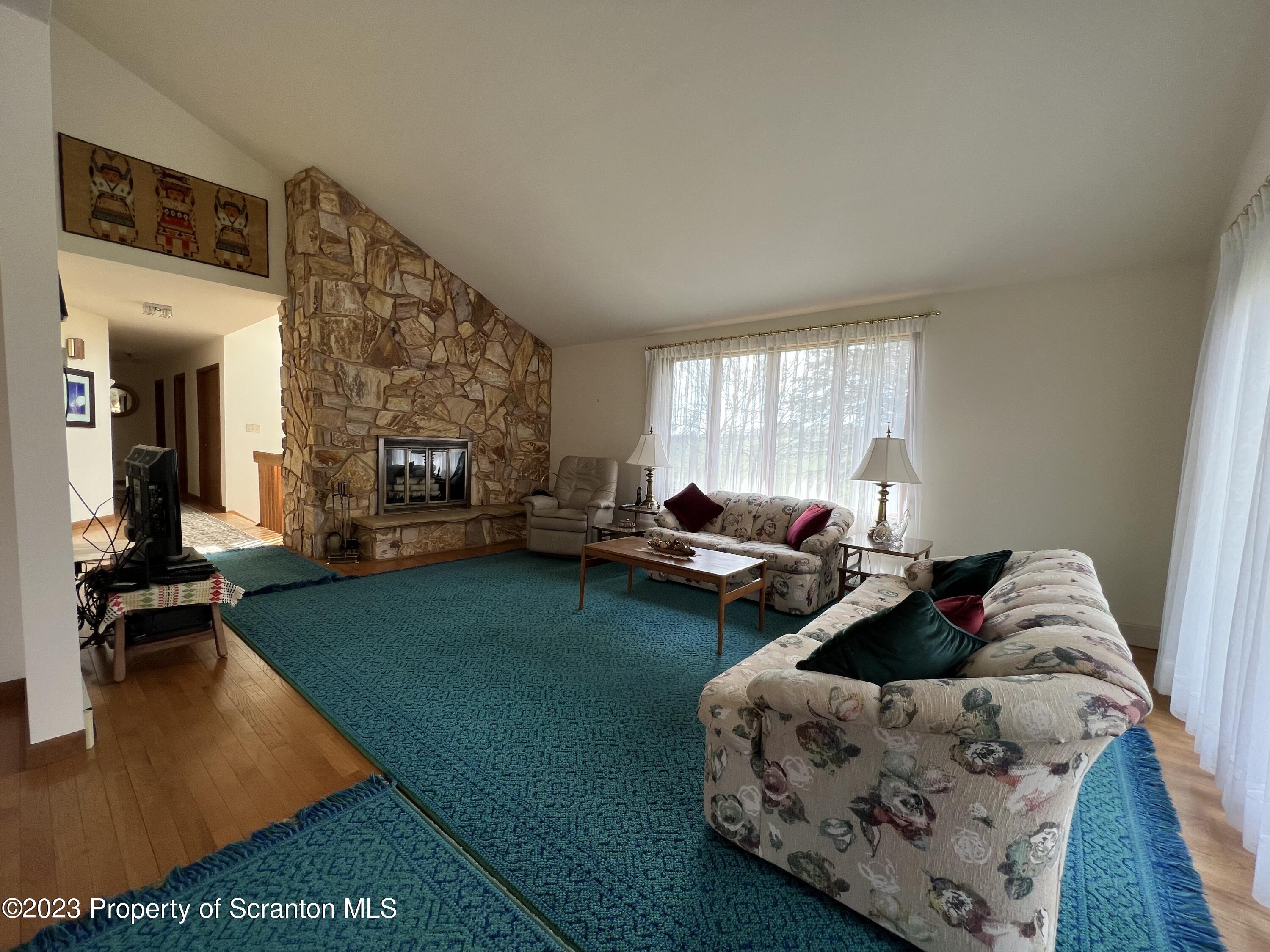 4935 Highway 3001 Meshoppen, PA 18630 - Photo 5 of 31 a living room with furniture and a table