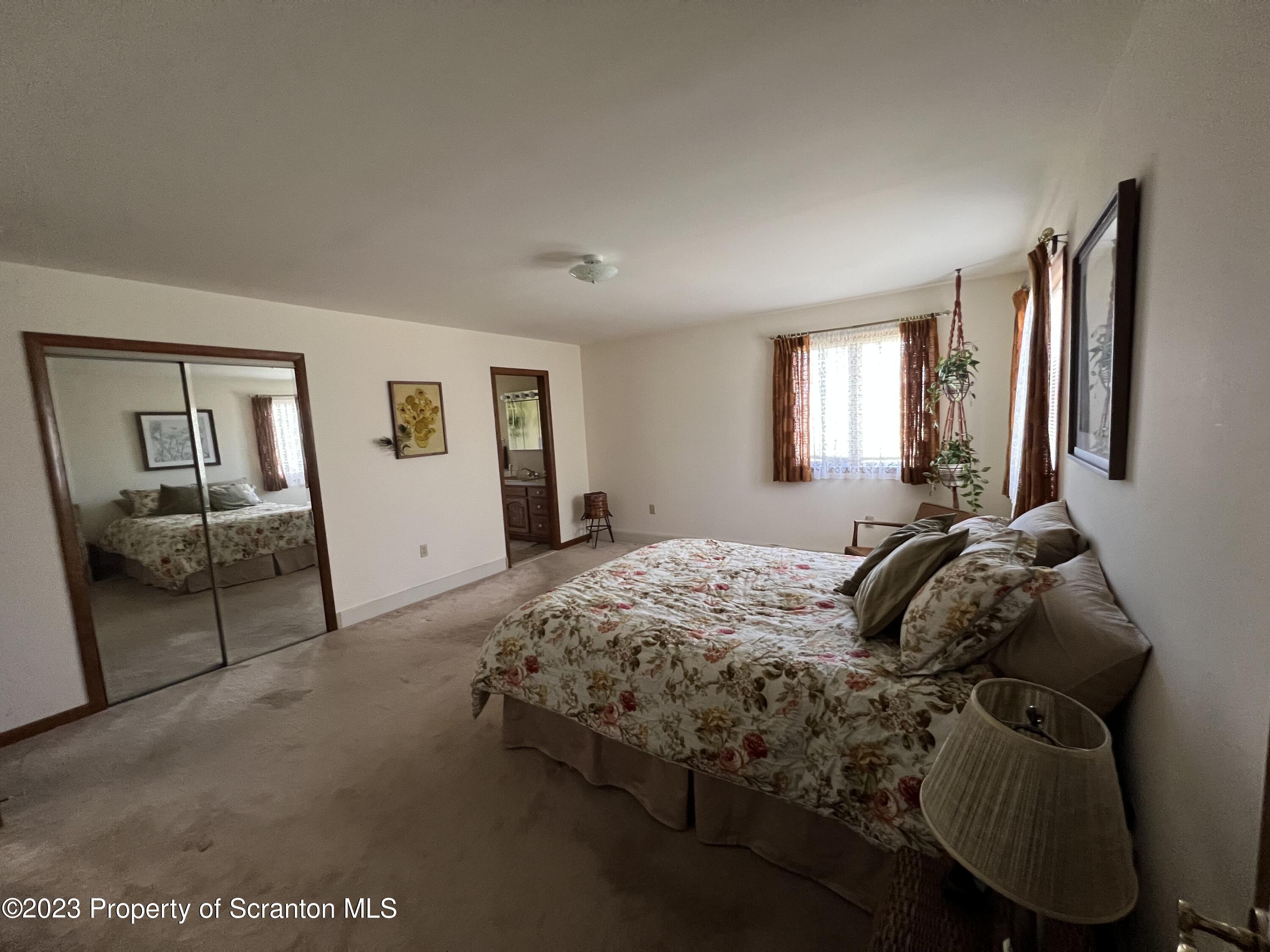 4935 Highway 3001 Meshoppen, PA 18630 - Photo 10 of 31 a bedroom with a bed and window