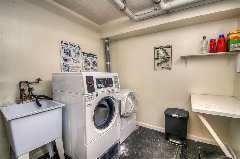 9995 Shore Road, Unit 18C Brooklyn, NY 11209 - Photo 12 of 15 a utility room with dryer washer and other items