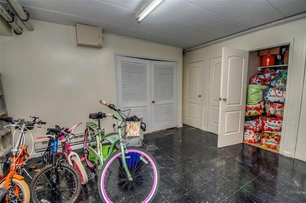 9995 Shore Road, Unit 18C Brooklyn, NY 11209 - Photo 13 of 15 a view of a storage room with a lot of stuff