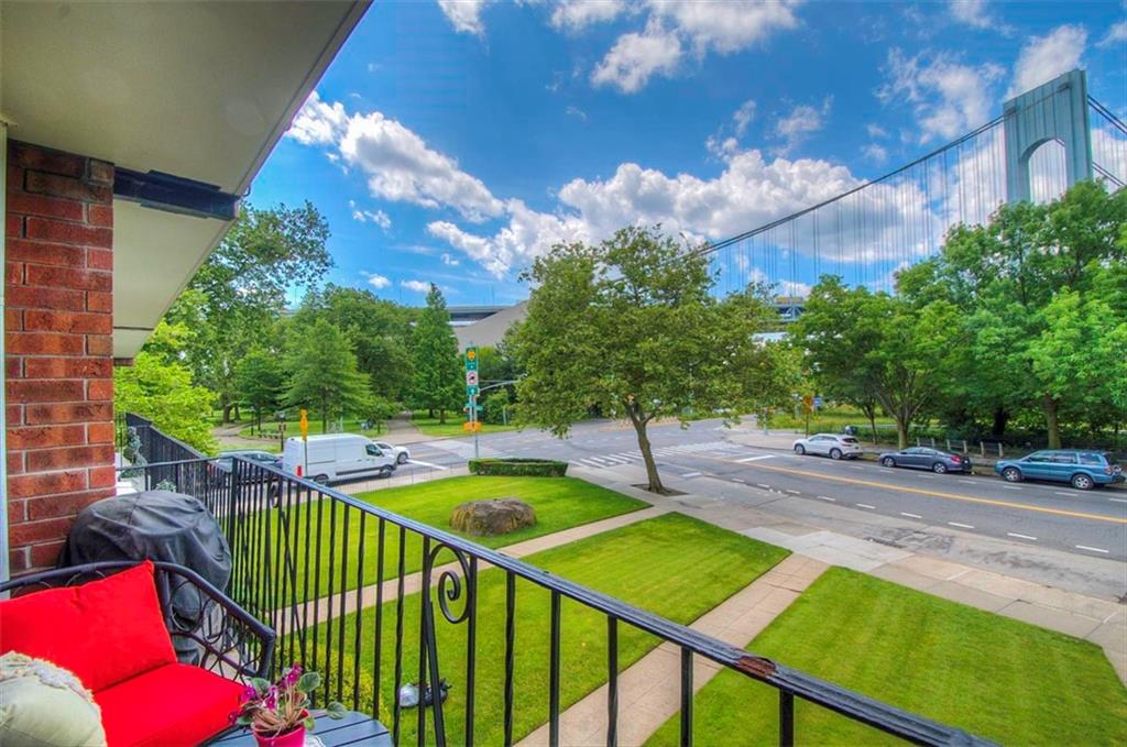 9995 Shore Road, Unit 18C Brooklyn, NY 11209 - Photo 14 of 15 a view of a backyard with swimming pool