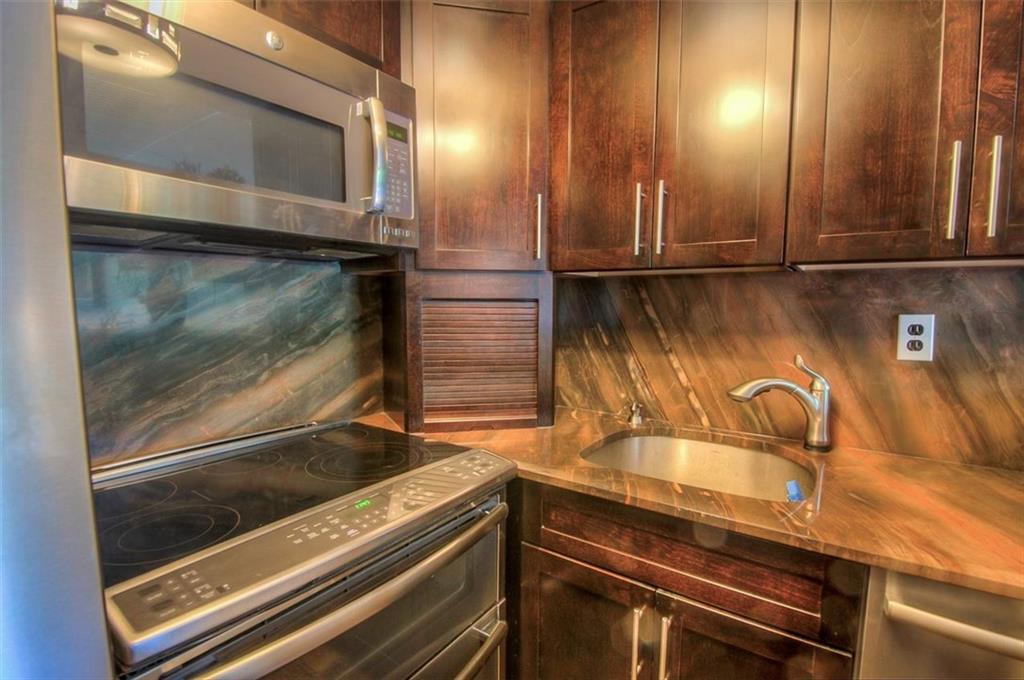 9995 Shore Road, Unit 18C Brooklyn, NY 11209 - Photo 6 of 15 a view of a microwave oven