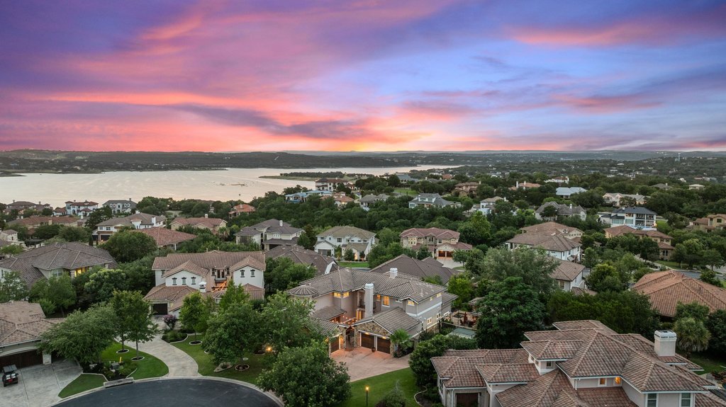 109 Largo Cove Austin, TX 78734 - Photo 5 of 40 Perched above the lake, this community boasts commanding views and serene natural surroundings.