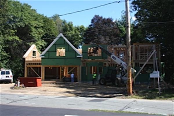 14 Oakridge Road Wellesley, MA 02481 - Photo 11 of 14 a front view of a house with garden
