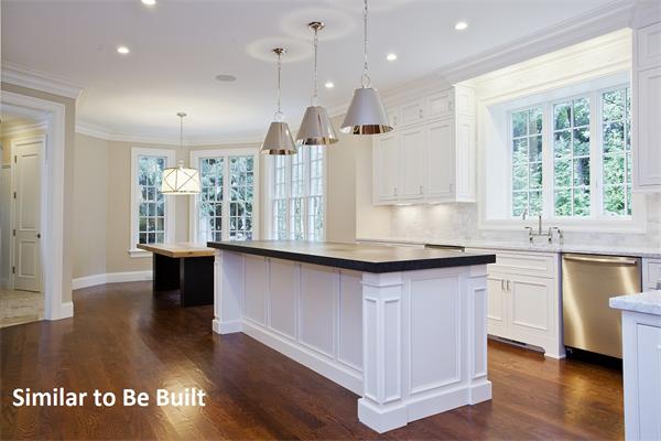 14 Oakridge Road Wellesley, MA 02481 - Photo 5 of 14 a kitchen with granite countertop a stove a sink and white cabinets with wooden floor