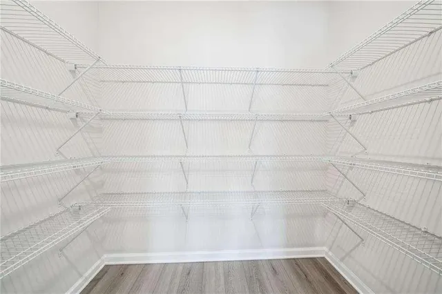 a view of a room with racks on the wall