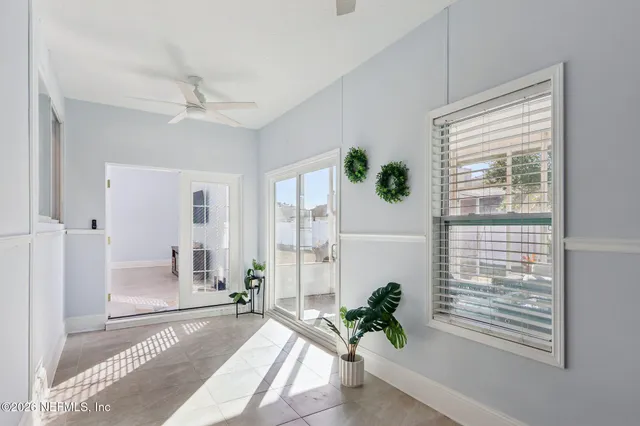 a kitchen with stainless steel appliances a refrigerator sink and cabinets