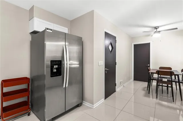 a view of a workspace space with furniture and wooden floor