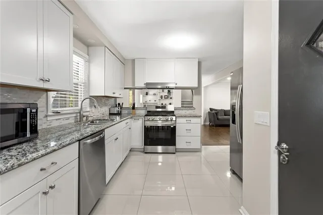 a room with furniture and a window