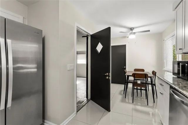 a view of hallway with livingroom