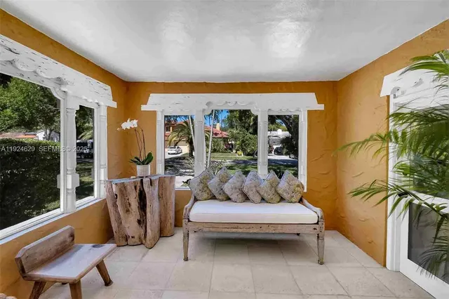 a outdoor living space with furniture and a patio