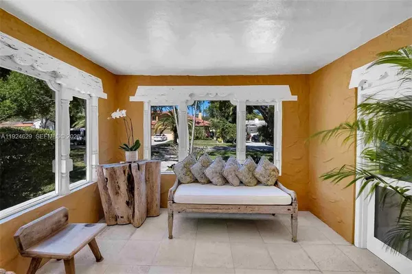 a outdoor living space with furniture and a patio